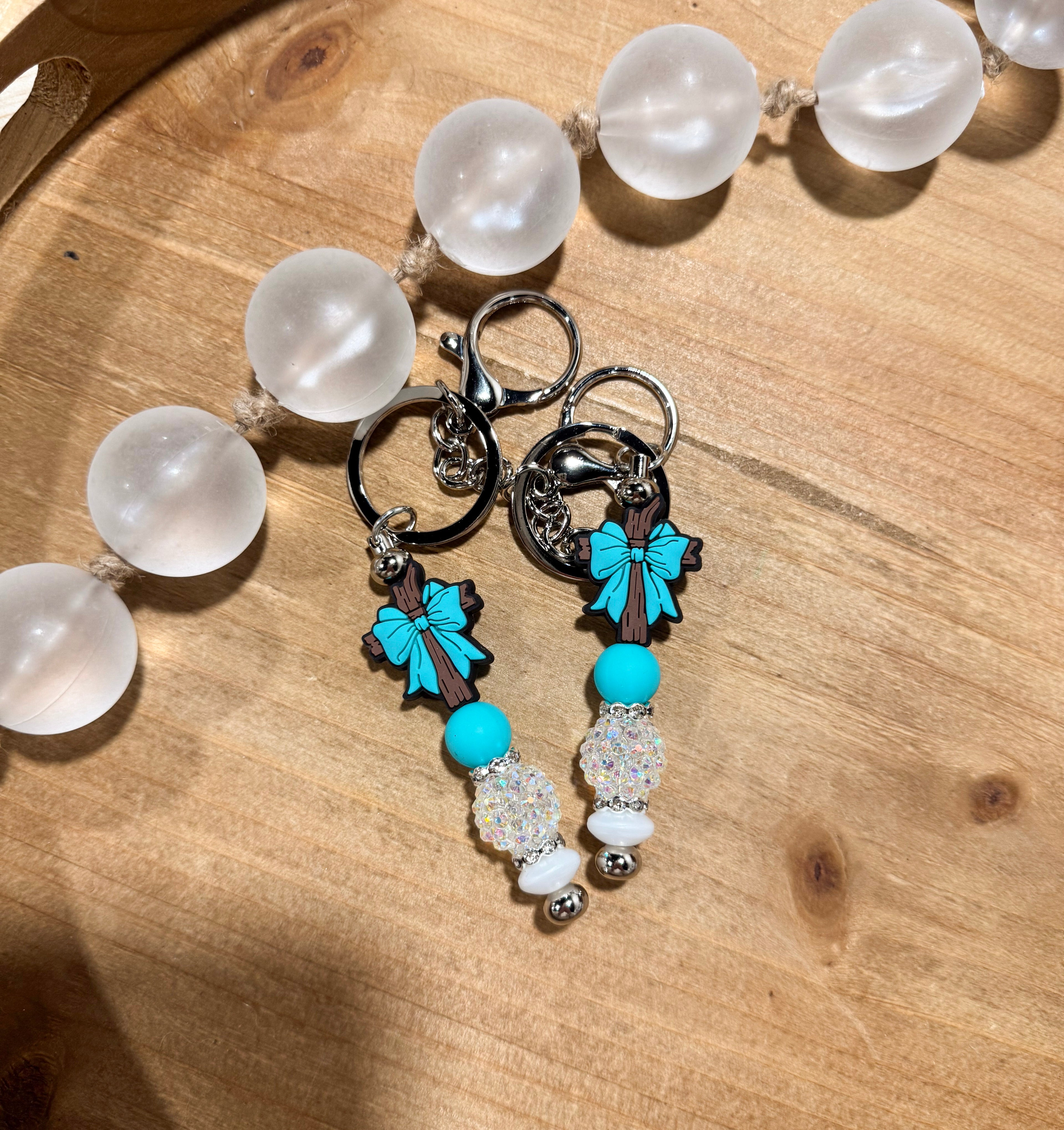 Turquoise Bow Cross Bar Keychain